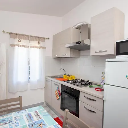 Erminia House - Orange Flat *